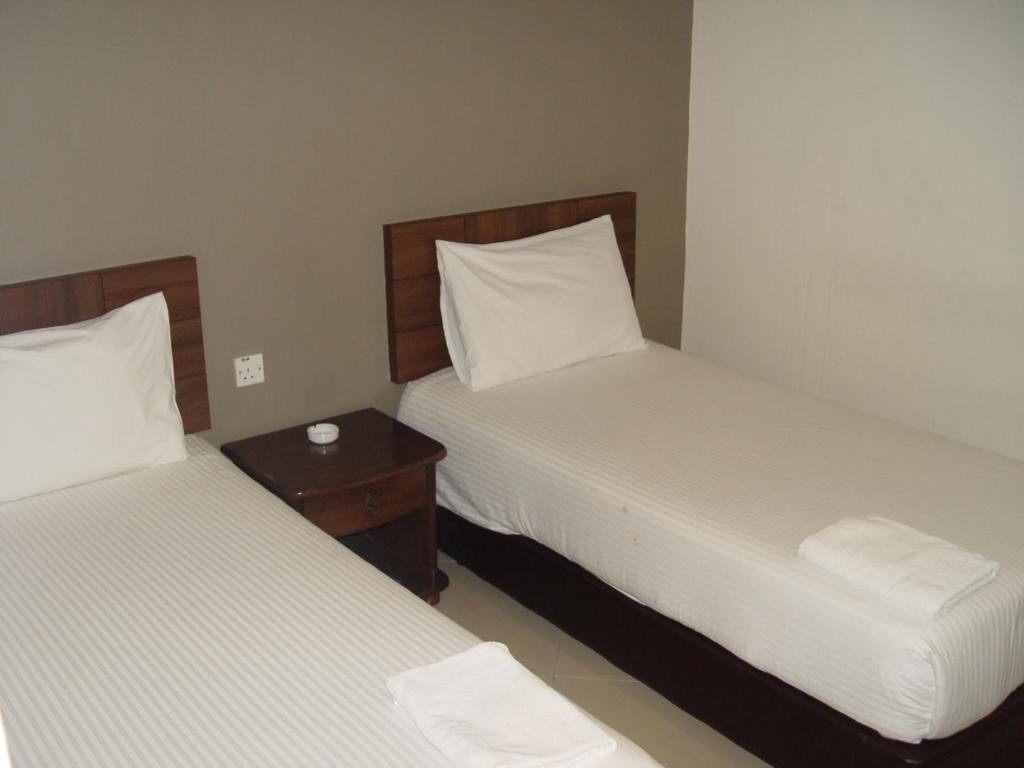 Jb City Hotel Τζόχορ Μπάχρου Δωμάτιο φωτογραφία
