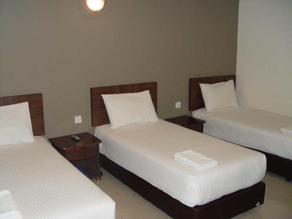 Jb City Hotel Τζόχορ Μπάχρου Δωμάτιο φωτογραφία